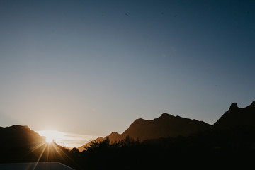 A beautiful sunrise from behind table mountain in Cape Town South Africa. 