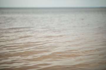 water surface and small waves, transparent water, texture or background for text