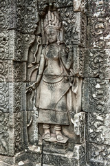 Fototapeta na wymiar Bas Relief of a Devataor Apsara in The Bayon Temple, Cambodia