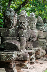 Statues on the Bridge Leading to the Victory Gate in the Ancient City of Angkor Thom, Cambodia