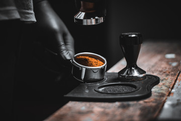 Close-up Baristas make espresso at home. Coffee Brewing Manual