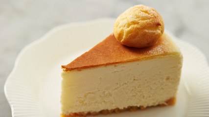 Small profiterole on cheese cake