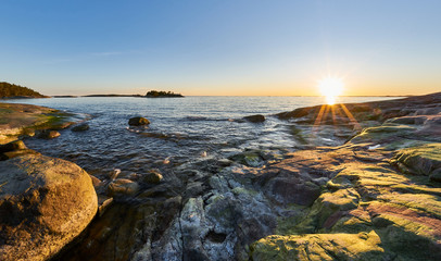 Sun and rocky seashore