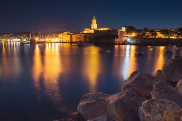 Obraz premium Night view of coastline in Krk town on the island Krk, Croatia