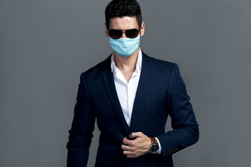 Man wearing face mask. Studio fashion portrait.