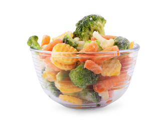 Glass dish on a white background, isolated Pile of frozen vegetables