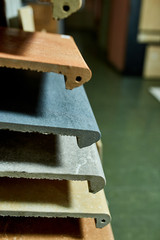 Various decorative tiles samples. Colorful samples of a stone tile in store. Copy space.