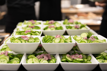 Cucumber salad to be served with traditional German meal at Oktoberfest