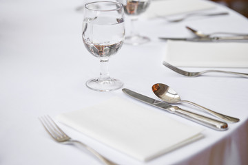 Table setting close up at restaurant 