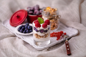 breakfast of berries and yogurt cereals
