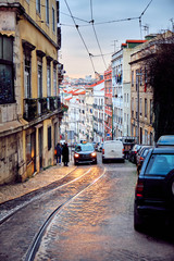 Lisbon, Portugal. Street with rails. City landscape.