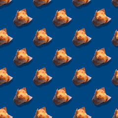 Seamless pattern wiht creamy muffins and classic blue background. Creative colorful banner.