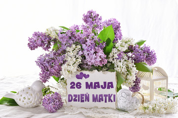 bunch of lilac blossoms for moms with inscription in Polish language translated as May 26th Mothers Day