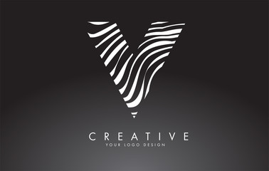 V Letter Logo Design with Fingerprint, black and white wood or Zebra texture on a Black Background.