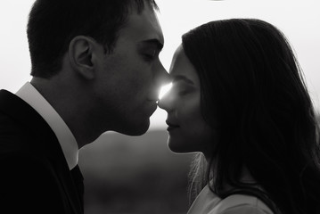 bride and groom at wedding walk enjoy each other outdoor with beautiful view at sunset