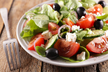 vegetable salad with cheese, onion tomato and olive