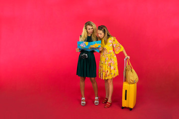 Caucasian tourist looking at map in studio