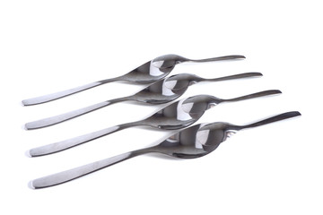 metal spoons on a white background. Spoons for eating.
