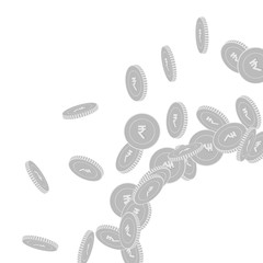 Indian rupee coins falling. Scattered black and wh