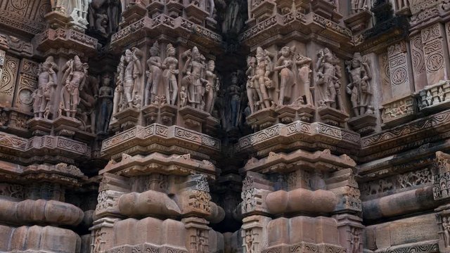 Erotic sculptures at the Parshvanatha temple, within the Khajuraho Group of Monuments in the Chhatarpur district, Madhya Pradesh, India, Asia