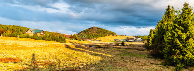 Bukovec mountain above Jizerka village at sunset time. Spring in Jizera Mountains, Czech Republic.