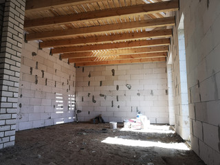 unfinished room with wooden ceiling