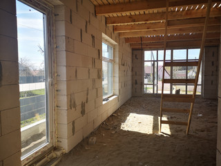 unfinished room with wooden ceiling