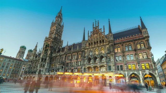Munich marienplatz square time lapse hyperlapse video, town hall and church city centre.