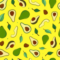 cute seamless pattern with hand drawn avocados and leaves on yellow backgorund. Wallpaper, textile and fabric print, scrapbooking, stationery design