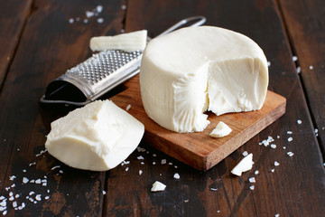 South Italian cheese cacioricotta with a grater
