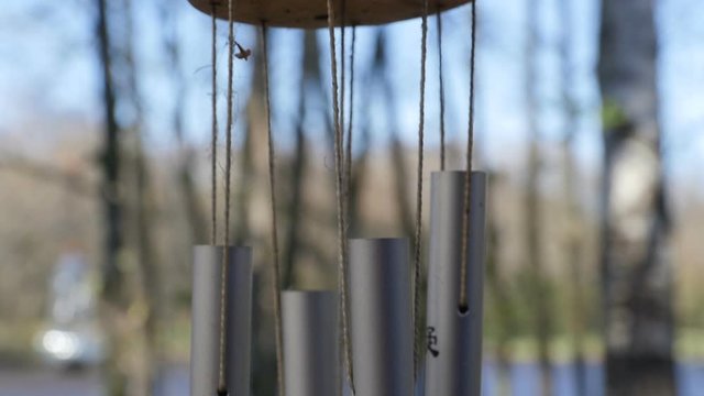 Hanging bell wind chime close-up from top to bottom