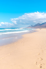 Fototapeta na wymiar Waters of the Atlantic Ocean. Mysterious Cofete Beach, Fuerteventura, Jandia Peninsula