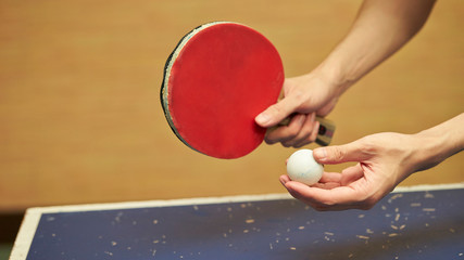 Man trying to serve table tennis 