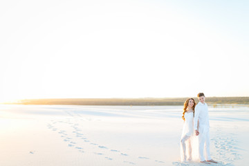 Newlyweds on a white desert island