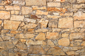 Big yellow wall from stone bricks