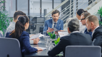 In the Modern Corporate Office Meeting Room: Diverse Group of Businesspeople, Lawyers, Executives and Members of the Board of Directors Talking, Negotiating, Use Documents and Consult Statistic Graphs - obrazy, fototapety, plakaty