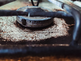Close up of an old rusty kitchen stove
