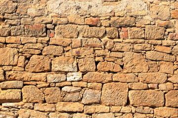 Big yellow wall from stone bricks