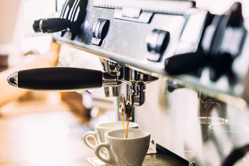 Making coffee in the coffee machine. Fresh espresso.