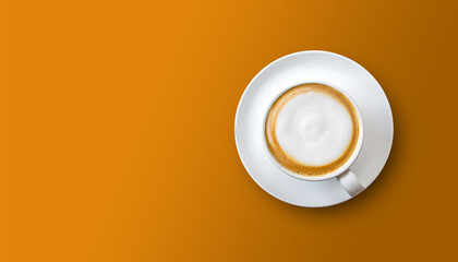 cup of coffee hot latte on orange background. top view