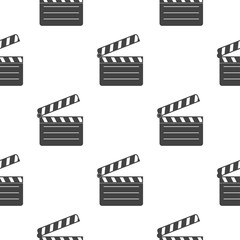 Clapper board. Black flat movie symbol. Seamless pattern