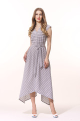 Fototapeta premium business woman executive in summer casual print maxi dress full body photo
