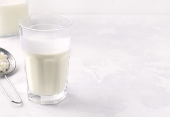 Fermented milk drink kefir on a white background. Copy space