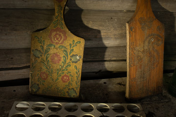 Kitchen of an old abandoned village house - kitchen utensils: cutting boards, egg cells