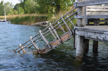 old pier. descent into the water.