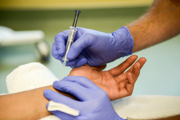 A Respiratory Therapist is preparing to perform an arterial blood gas puncture to collect arterial...