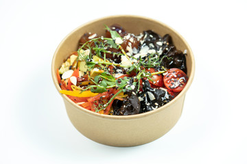 Hawaiian salmon fish poke bowl with rice, radish,cucumber, tomato, sesame seeds and seaweeds. Buddha bowl. Diet food