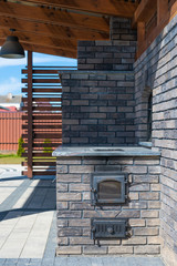 outdoor kitchen made of decorative bricks. for frying meat