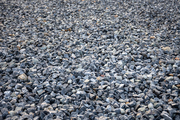 Blue construction gravel texture background. Small granite stone full frame background.