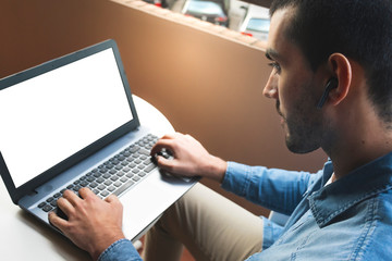 Man working with laptop at home